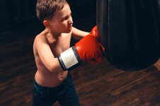 aggressive-child-boxing-gloves_127093-232.jpg